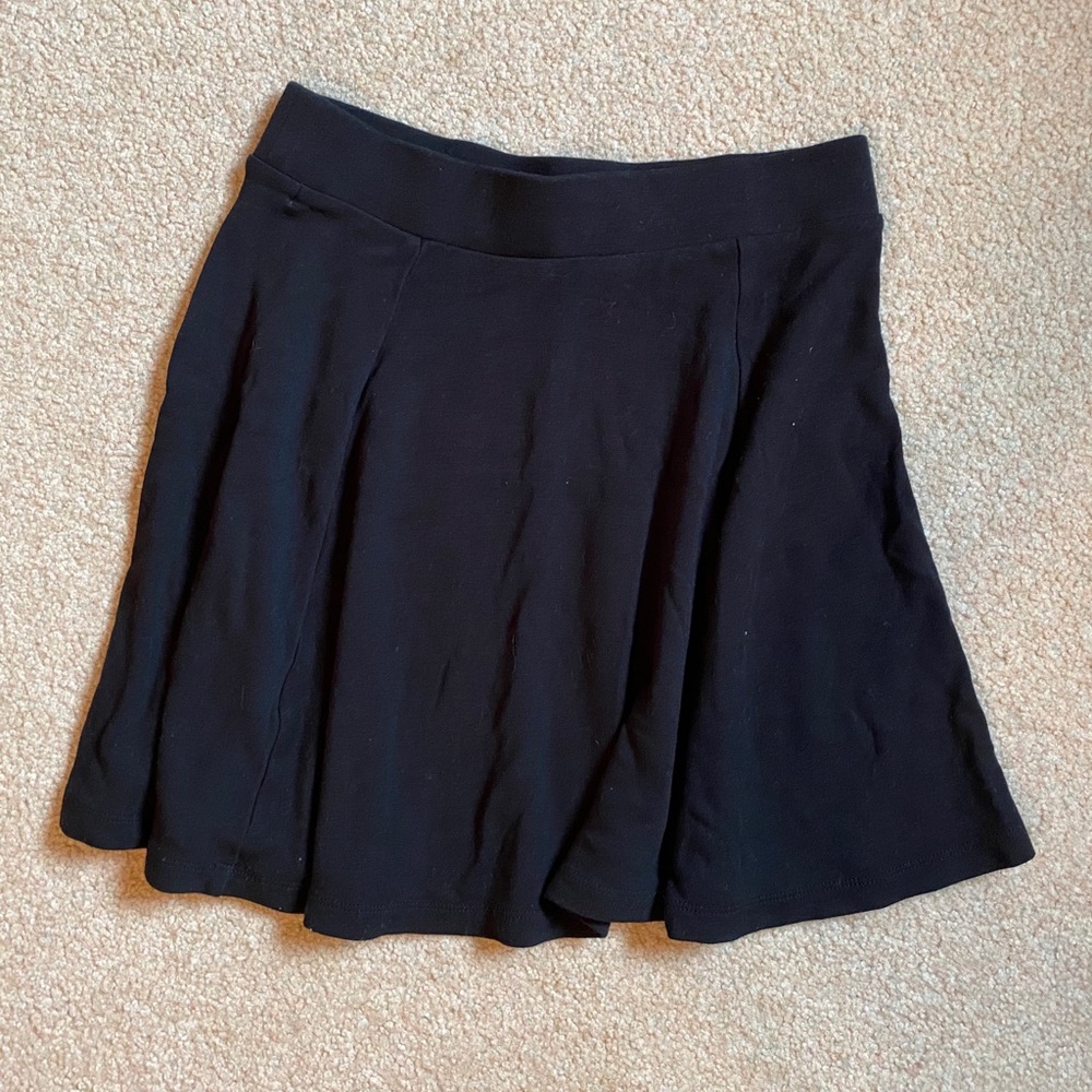 Plain black flowy mini skirt